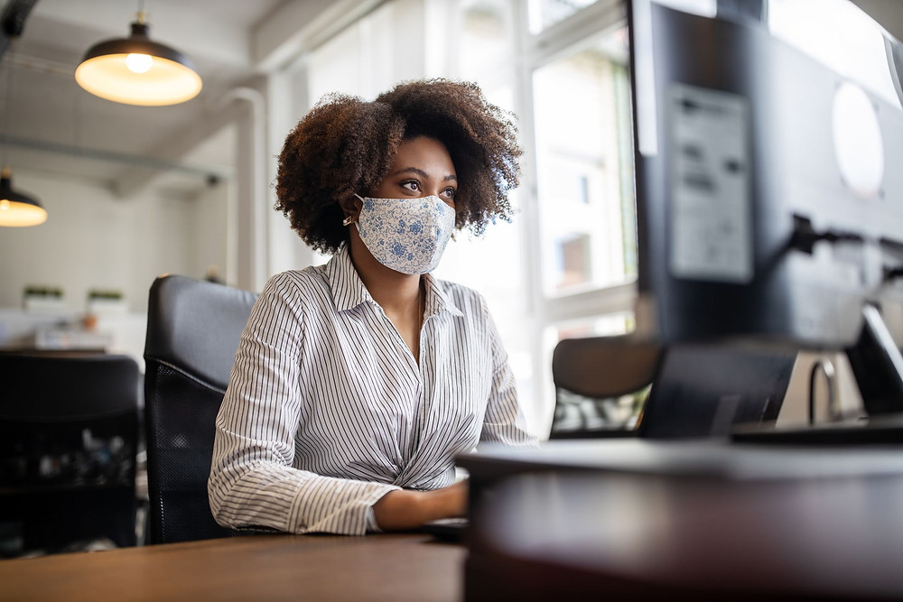 Employees with facemasks during the pandemic