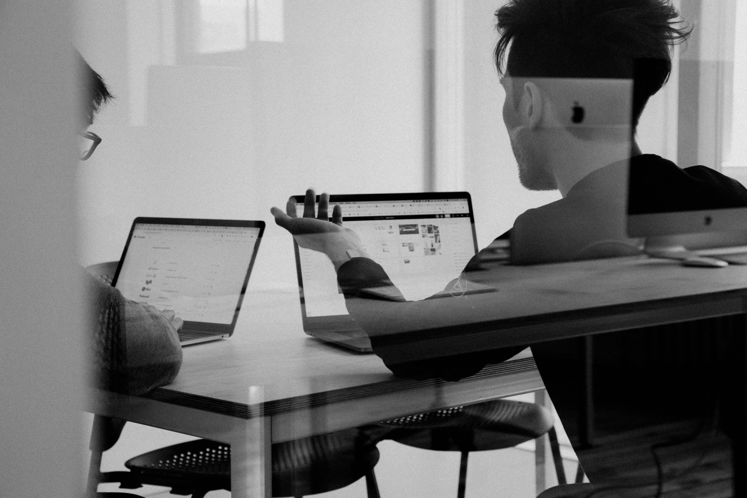 Two employees discussing